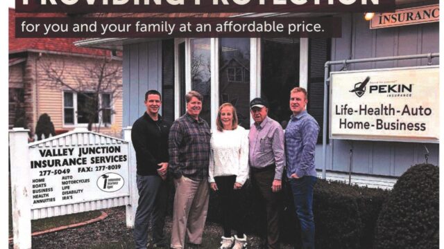 Valley Junction Insurance Services employees on poster