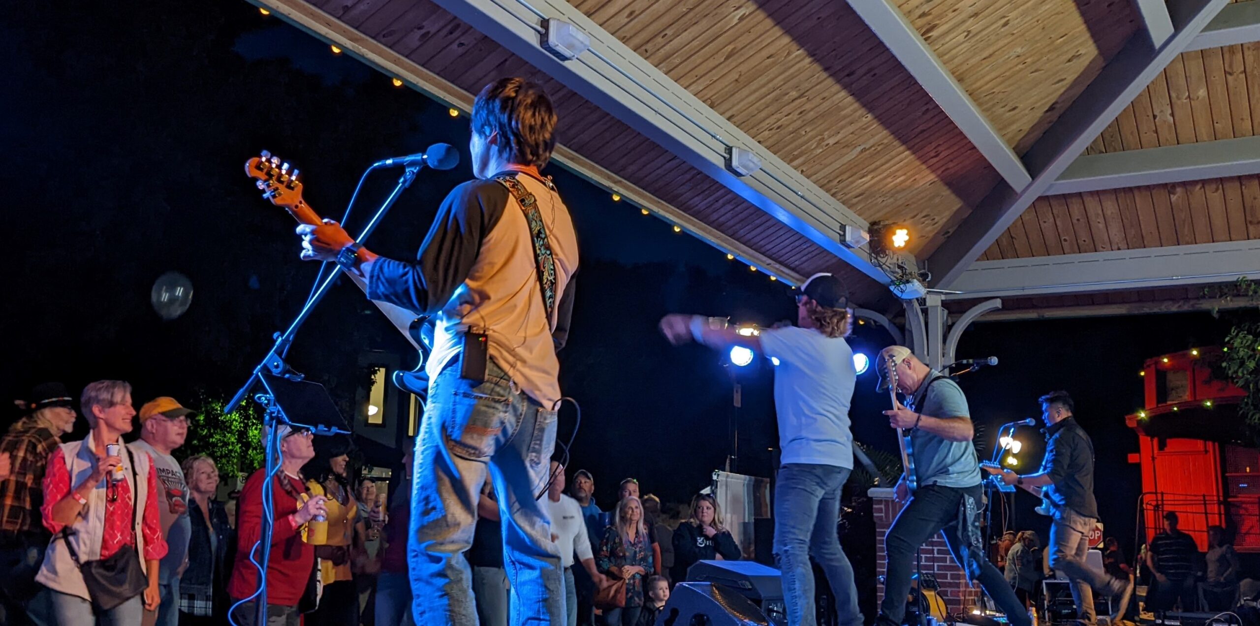 Valley Junction musicians on a stage at an event